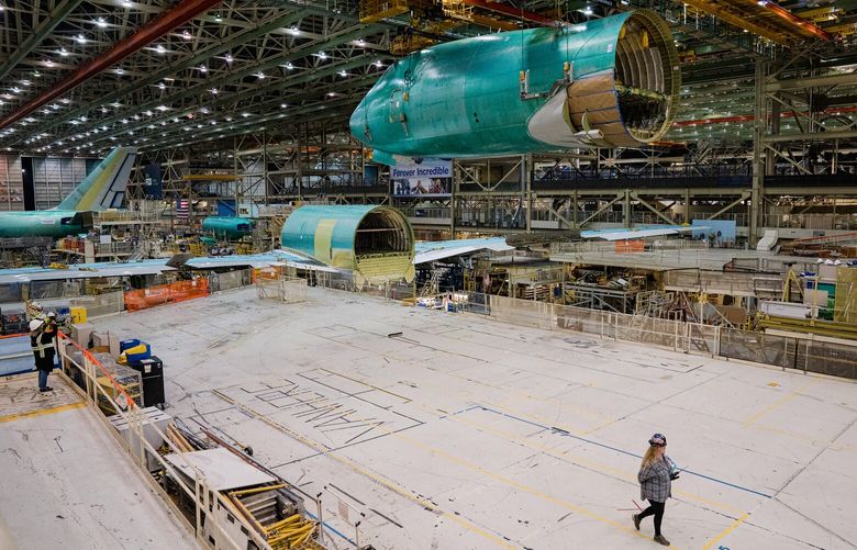 FILE – Jet fuselages at Boeing’s fabrication site in Everett, Wash., Sept. 28, 2022. Some recently manufactured Boeing and Airbus jets have components made from titanium that was sold using fake documentation verifying the material’s authenticity, according to a supplier for the plane makers. (Jovelle Tamayo/The New York Times)