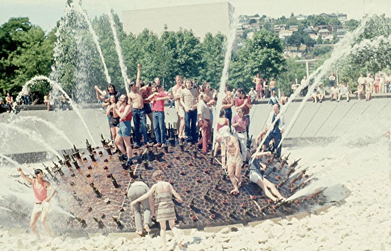In 1974, revelers at the main event of the first Seattle Pride week ran into the fountain at Seattle Center to celebrate and “let people know that we’re a happy, healthy, out group,” said David Neth, the primary organizer of the event. (Courtesy of David Neth)