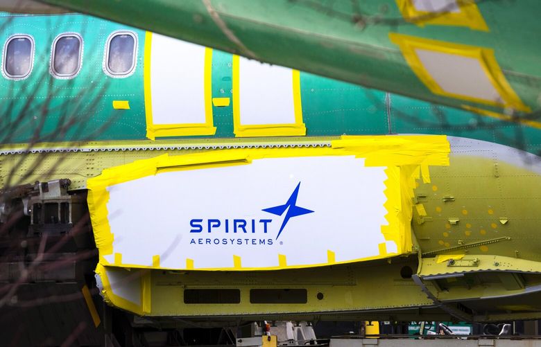The Spirit Aerosystems logo can be seen on a 737 MAX fuselage at the Boeing factory in Renton on March 1. (Ellen M. Banner / The Seattle Times)