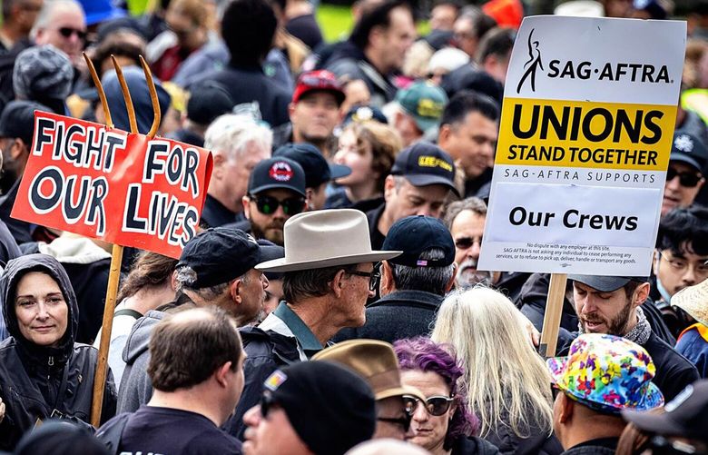 Hollywood crew members union IATSE rally at Woodley Park to kick off their contract negotiations with the major studios on March 3, 2024, in Encino, California. (Jason Armond/Los Angeles Times/TNS) 114736715W