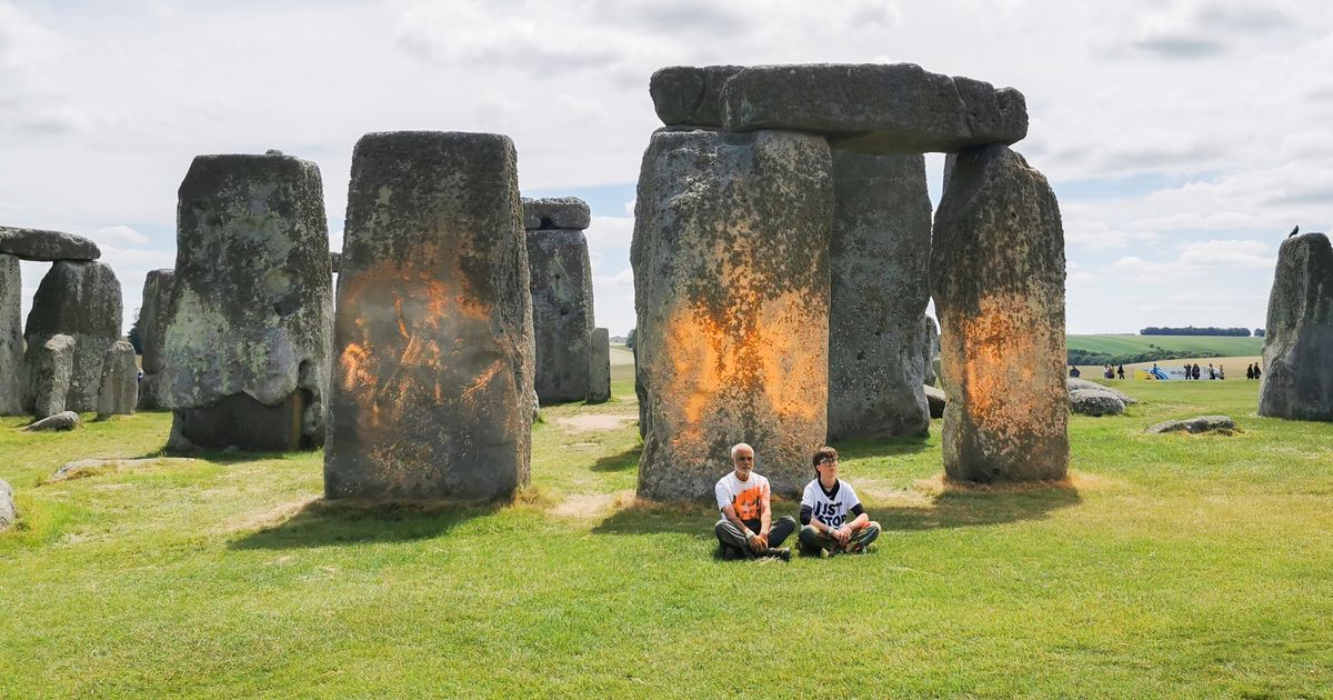 Climate protesters arrested after painting Stonehenge monument orange