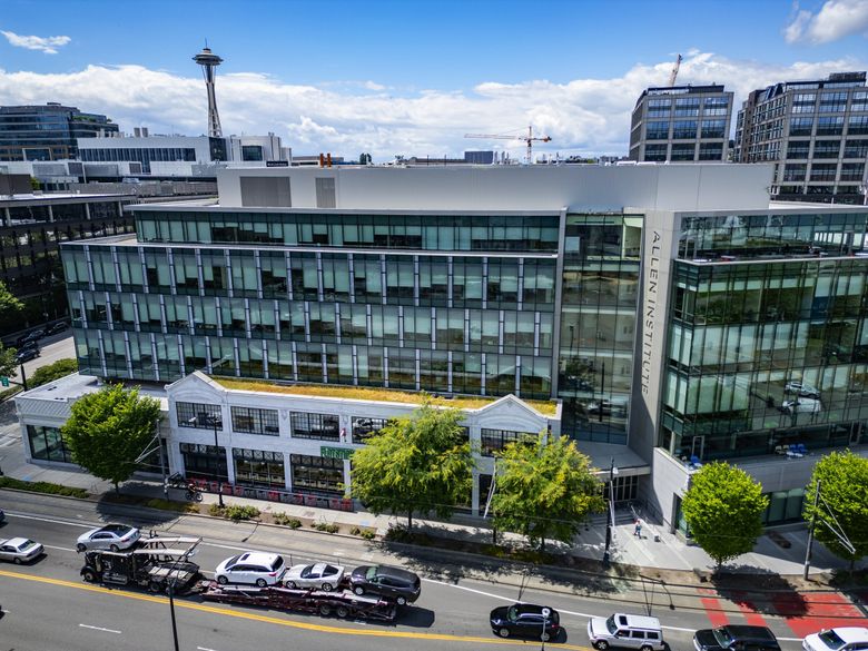 Two historical automobile showrooms at Westlake and Mercer front the Allen Institute, as seen from the air. (Ken Lambert / The Seattle Times)