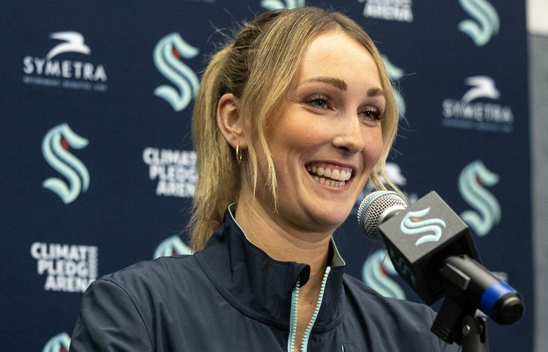 Kraken assistant coach Jessica Campbell laughs during a press conference on Wednesday, July 3, 2024, in Seattle.