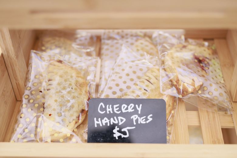 Cherry hand pies made by Danitra Porter, who owns The Queen Sugar Baking Company, seen at a new monthly SeaTac farmers market at Matt Griffin YMCA on Wednesday. (Ivy Ceballo / The Seattle Times)