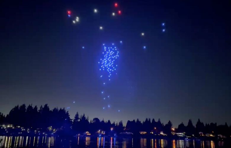Shortly after SeaTac’s drone light show began over Angle Lake on the evening of July 4, 2024, they started dropping out of the sky. The city said 55 of 200 drones owned by the Great Lakes Drone Company, of Coloma, Michigan, were lost. It was a costly mishap: SeaTac paid $40,000 for the show and the drones are valued at $2,600 each. The accident is under investigation. (Courtesy Matt Markovich)