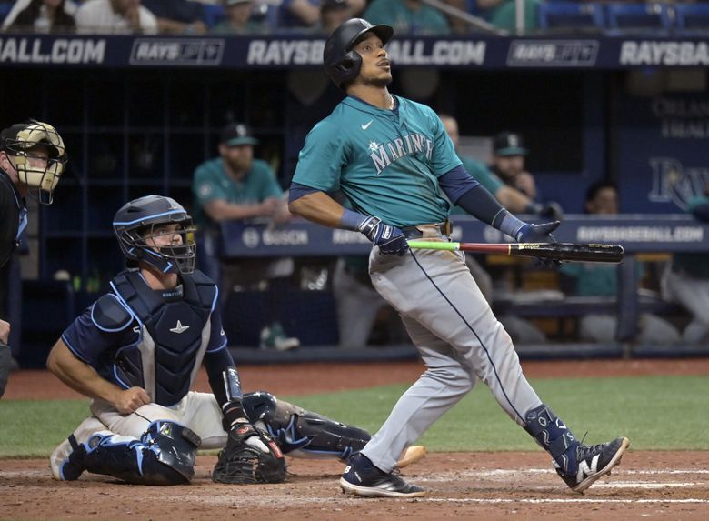 Seattle Mariners&#8217; Jorge Polanco watches a long foul ball during a baseball game, June 24, 2024, in St. Petersburg, Fla. (Steve Nesius / The Associated Press)