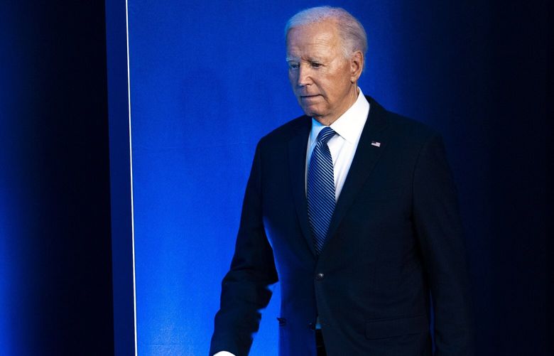 President Joe Biden arrives on stage for a family photo with NATO leaders during the NATO Summit at the Walter E. Washington Convention Center in Washington, Wednesday, July 10, 2024. Close allies of the president are developing a case for why he should end his re-election campaign, though it is not clear that the discussions have reached him. (Doug Mills/The New York Times)  XNYT0234 XNYT0234