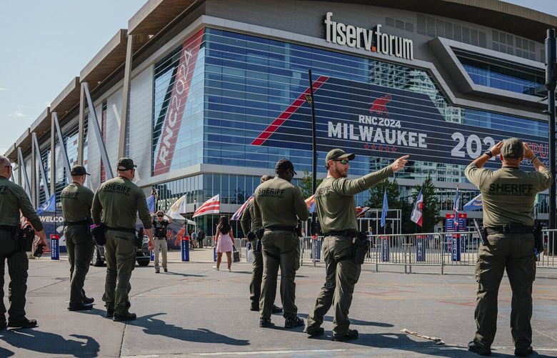 Law enforcement officers outside the Fiserv Forum in Milwaukee, the site of the Republican National Convention, on July 14, 2024. (Jamie Kelter Davis/The New York Times) XNYT0800 XNYT0800