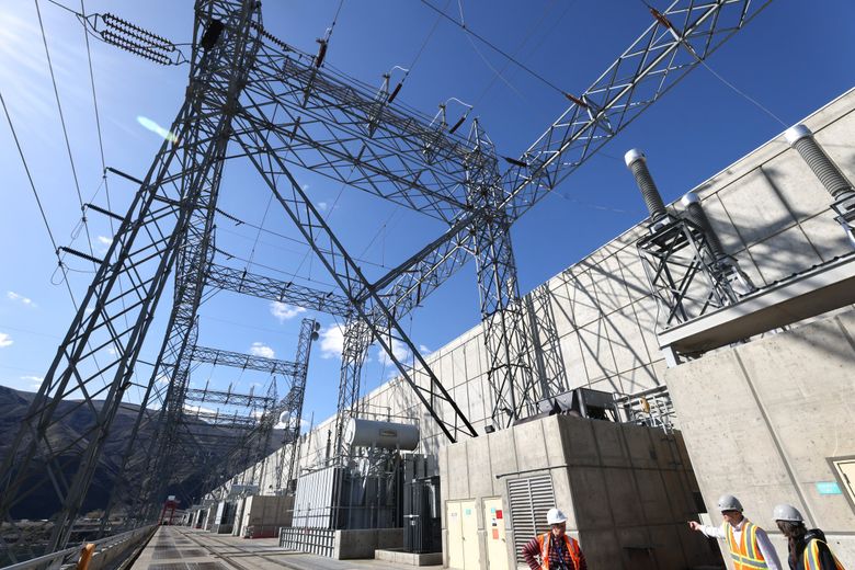 Grant County’s public utility district directs 10 turbines connected to generators inside Priest Rapids Dam in Mattawa from a central control room. (Karen Ducey / The Seattle Times)