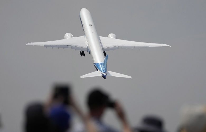 A Boeing 777X plane takes off at the Farnborough Air Show in 2022. The 2024 Farnborough International Air Show kicks off Monday in England. (AP Photo/Frank Augstein, File)