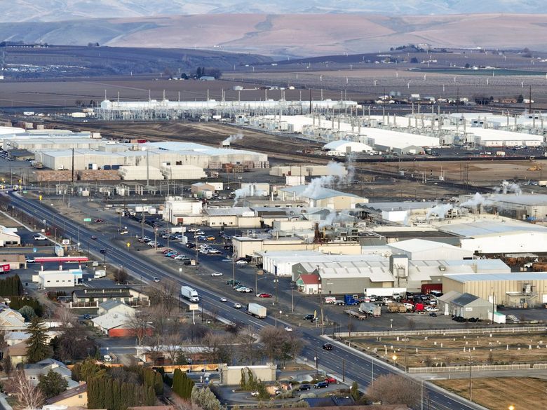 In rural Quincy, in Central Washington, agricultural producers and related industries are joined by  a data center, in the background. (Karen Ducey / The Seattle Times)