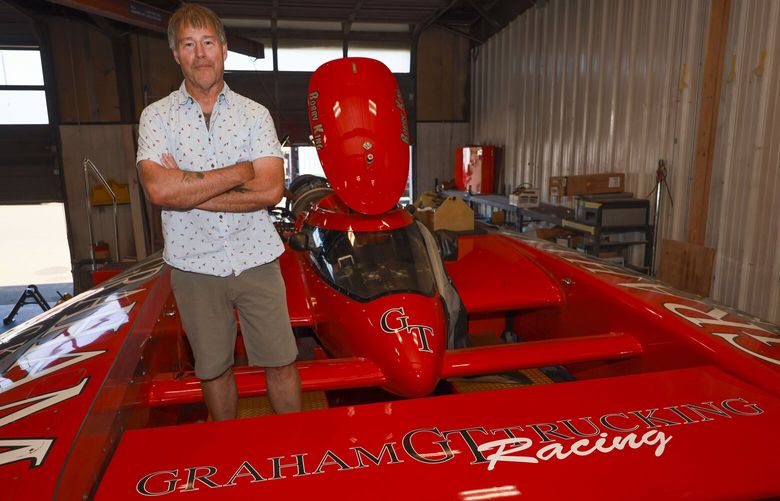 Rob Graham, who owns Graham Trucking and the hydro team of the same name, poses for a picture inside a garage at Graham Trucking in Milton on Friday, July 19, 2024.  227497_ic_hydroenterprise