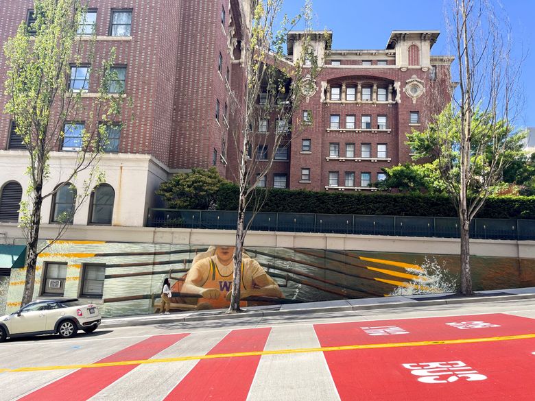 Artist Craig Cundiff painted a mural inspired by the book &#8220;The Boys in the Boat&#8221; by Daniel James Brown near First Hill&#8217;s Hotel Sorrento, as part of the Hope Corps Downtown Seattle Mural Project. (Courtesy Visit Seattle)