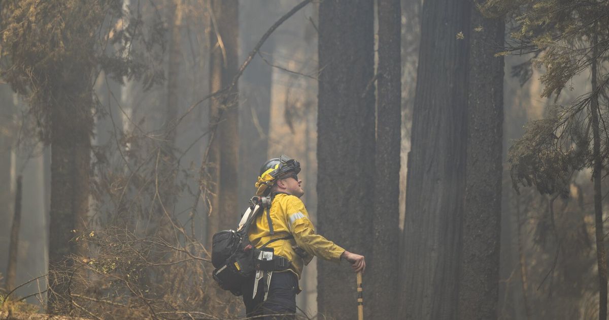 Firefighters make progress against massive blaze in California ahead of warming weather