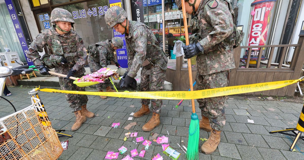 Trash dropped by a North Korean balloon falls on South Korea’s ...