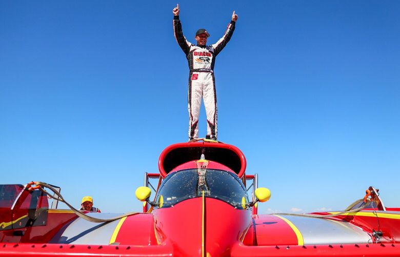 J.Michael Kelly stands atop U1 after the win is confirmed during Seafair Sunday at Genesee Park on Lake Washington in Seattle, Washington, on August 4, 2024. 227689