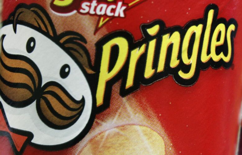 FILE – In this April 5, 2011 file photo, Pringles chips are seen in a posed photo at a West Bath, Maine grocery store.  (AP Photo/Pat Wellenbach, File) NYBZ306 NYBZ306