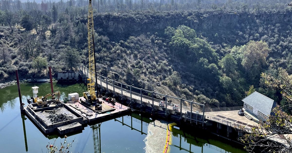 Workers are breaching Klamath dams, which will let salmon swim freely for first time in a century