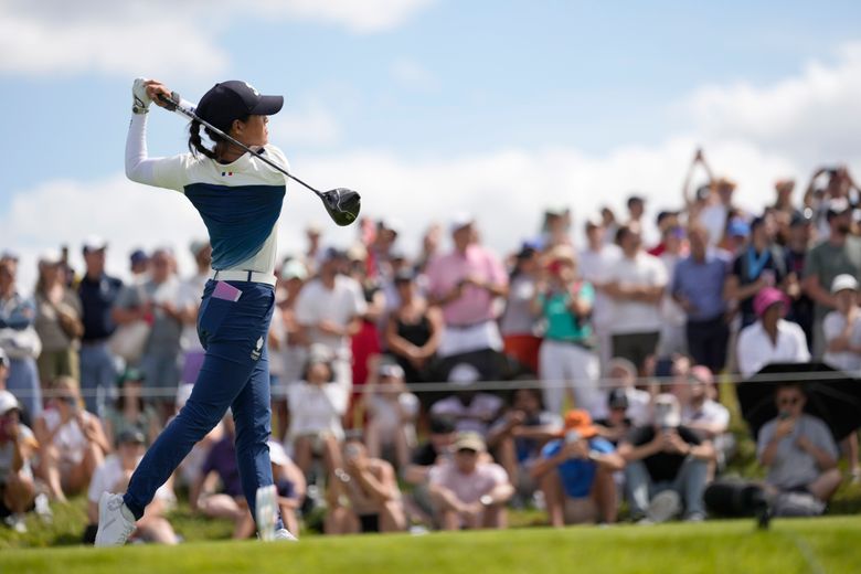 Celine Boutier, of France, plays off the 12th tee during the first round of the women&#8217;s golf event at the 2024 Summer Olympics, Wednesday, Aug. 7, 2024, at Le Golf National, in Saint-Quentin-en-Yvelines, France. (AP Photo/George Walker IV)