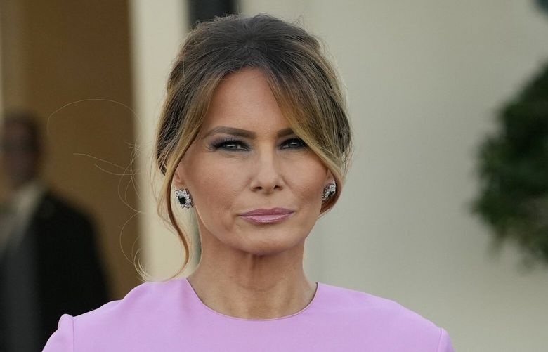 Former President Donald Trump, right, stands with his wife, Melania Trump, as they arrive for a GOP fundraiser, Saturday, April 6, 2024, in Palm Beach, Fla. (AP Photo/Lynne Sladky) PNA213