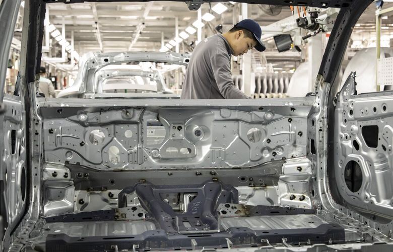 **EMBARGO: No electronic distribution, Web posting or street sales before 12:01 a.m. ET Sept. 3, 2024. No exceptions for any reasons.** FILE — A worker at a car factory in Hefei, China, Dec. 4, 2023. A surge in exports is helping fuel China’s growth, but it is also undermining profitability of key industries and drawing a backlash from trading partners. (Qilai Shen/The New York Times) XNYT0386