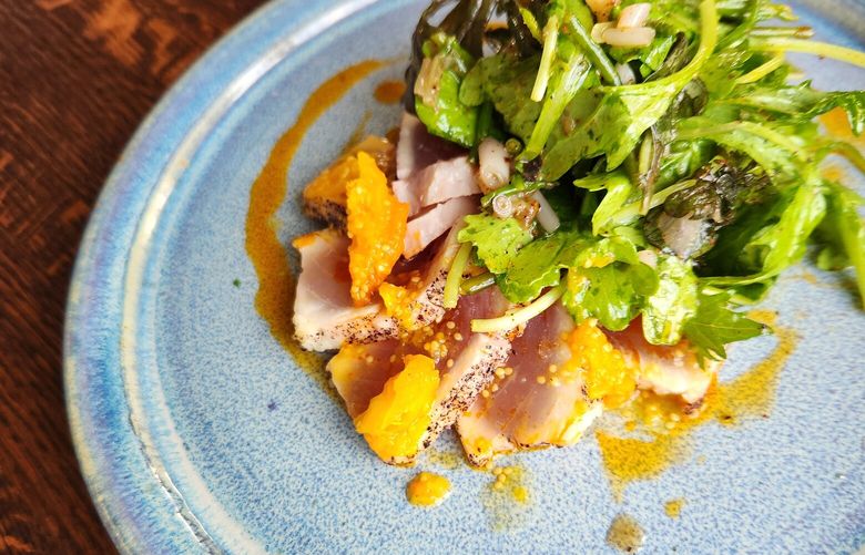 In July, local albacore tuna was served with a peppery salad of greens, pickled ramps and ground cherries at The Oystercatcher.