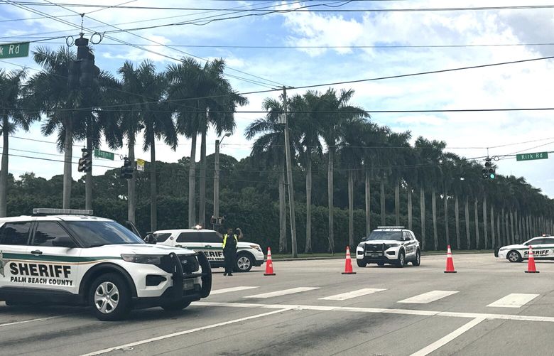 Sheriff vehicles are pictured near Trump International Golf Club, Sunday. Sept. 15, 2024, in West Palm Beach, Fla., after gunshots were reported in the vicinity of Republican presidential candidate former President Donald Trump. (AP Photo/Stephany Matat) FLPU501 FLPU501