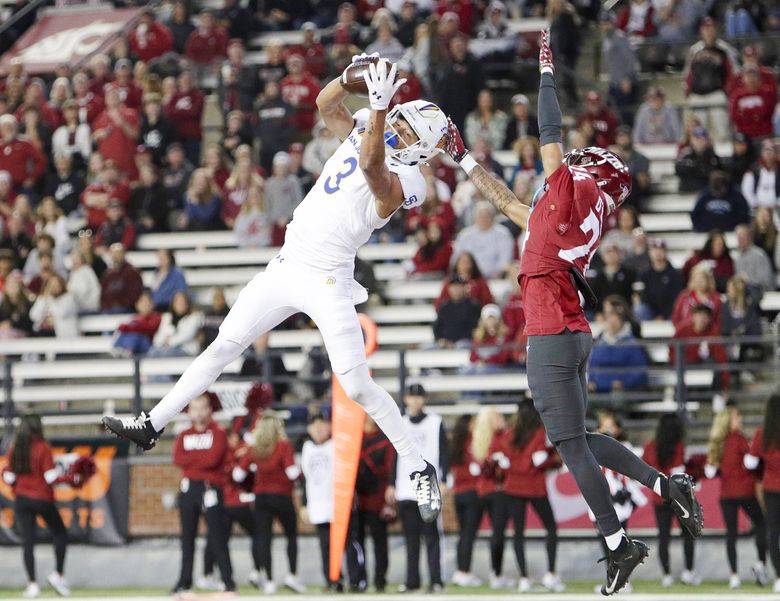 San Jose State wide receiver Nick Nash (3) catches a pass for a touchdown while pressured by Washington State defensive back Ethan O&#8217;Connor (24) during the second half of an NCAA college football game, Friday, Sept. 20, 2024, in Pullman, Wash. (Young Kwak / AP)