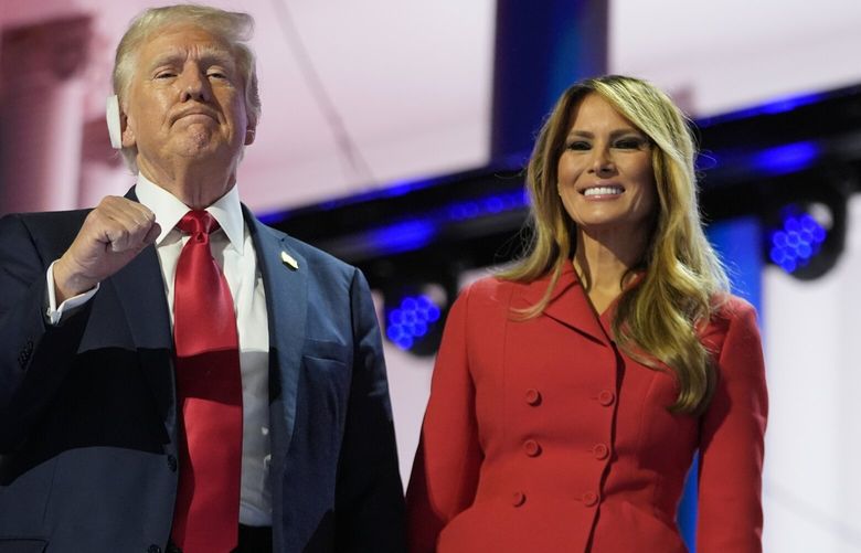 Republican presidential candidate former President Donald Trump and Melania Trump during the final day of the Republican National Convention Thursday, July 18, 2024, in Milwaukee. (AP Photo/Paul Sancya) WX201 WX201