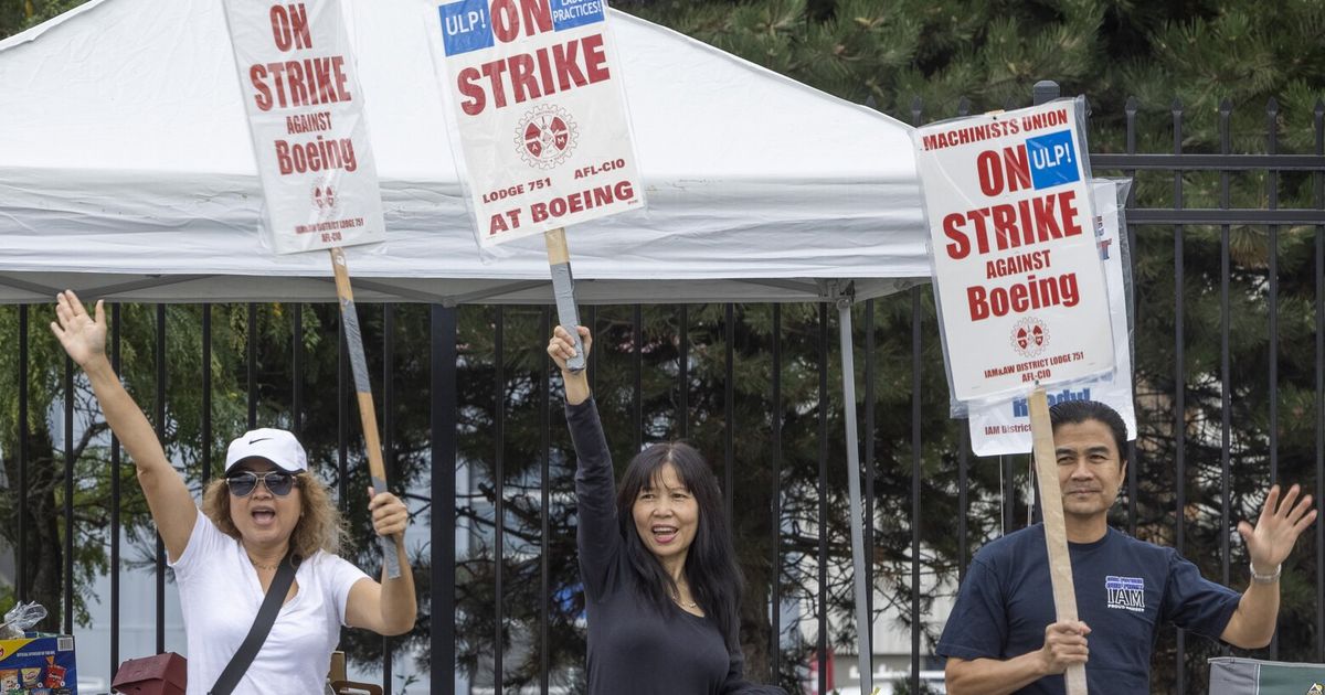 Boeing, Machinists back at the negotiating table as strike enters third