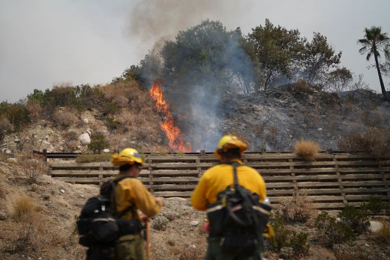 Evacuations ordered as wildfire burns in foothills of national forest east of LA | The Seattle Times