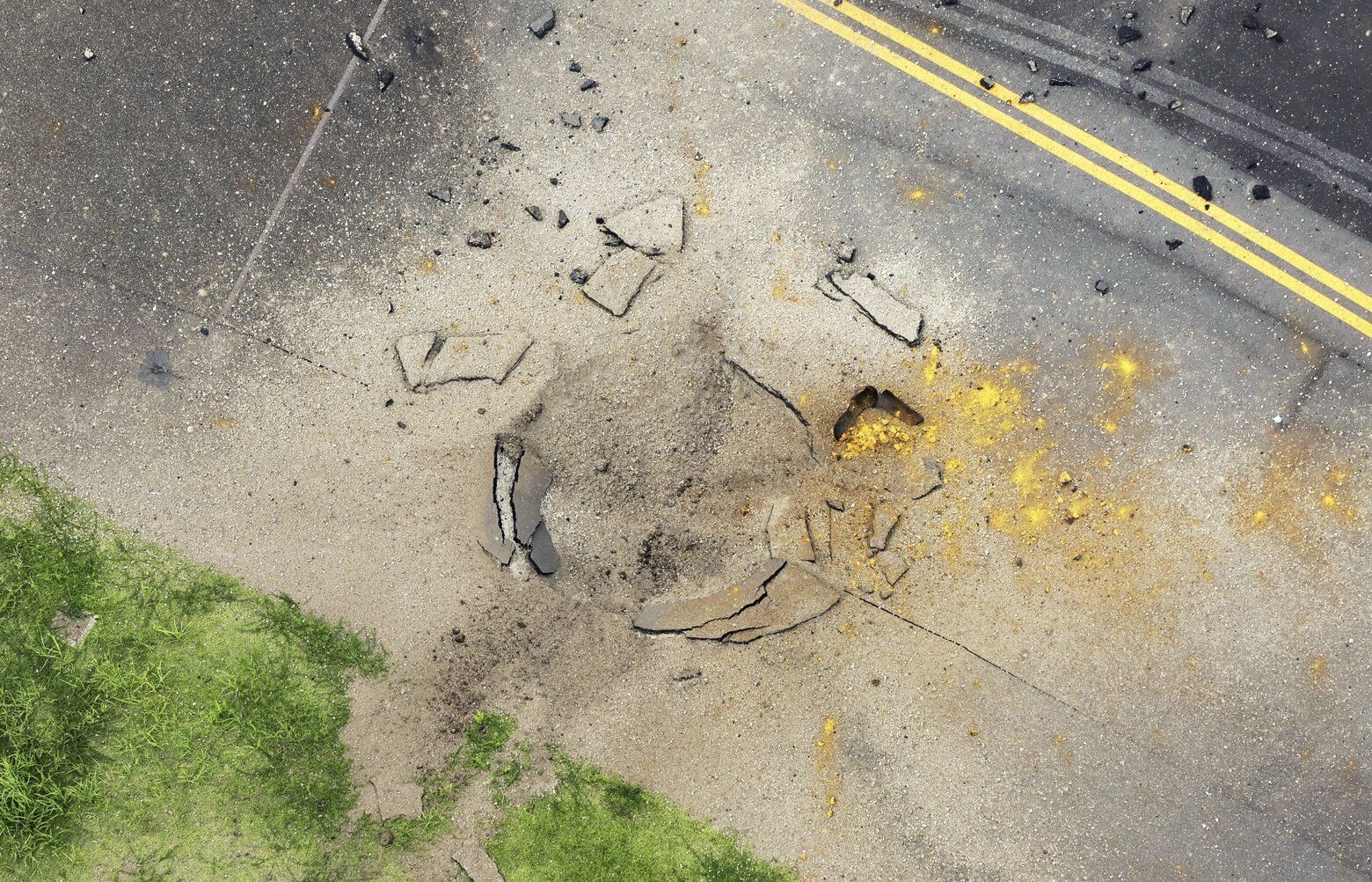 An American bomb from WWII explodes at a Japanese airport, leaving