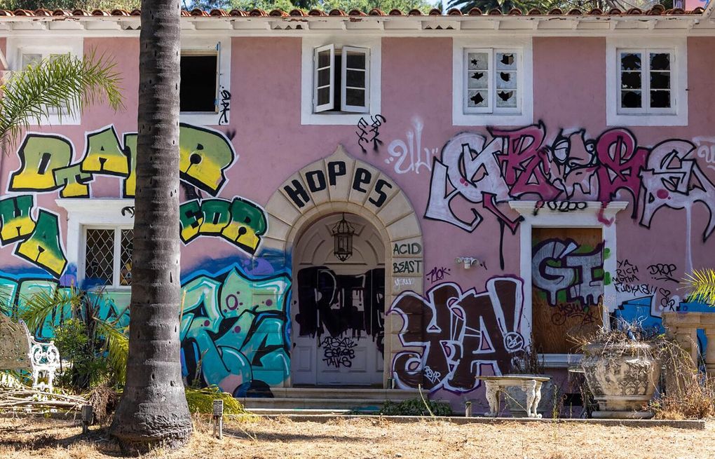 A Hollywood titan and a bin Laden once lived in this graffitied mansion