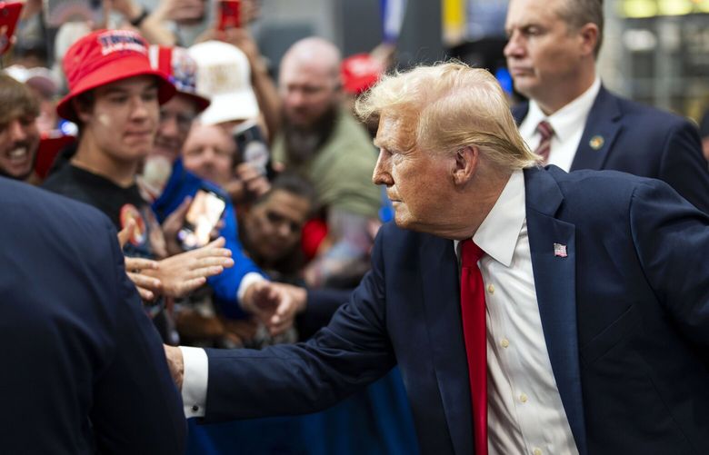 Former President Donald Trump, the Republican presidential nominee, greets supporters after speaking at a campaign rally at the the Mosack Group warehouse in Mint Hill, N.C., on Wednesday, Sept. 25, 2024. (Doug Mills/The New York Times) XNYT0775 XNYT0775