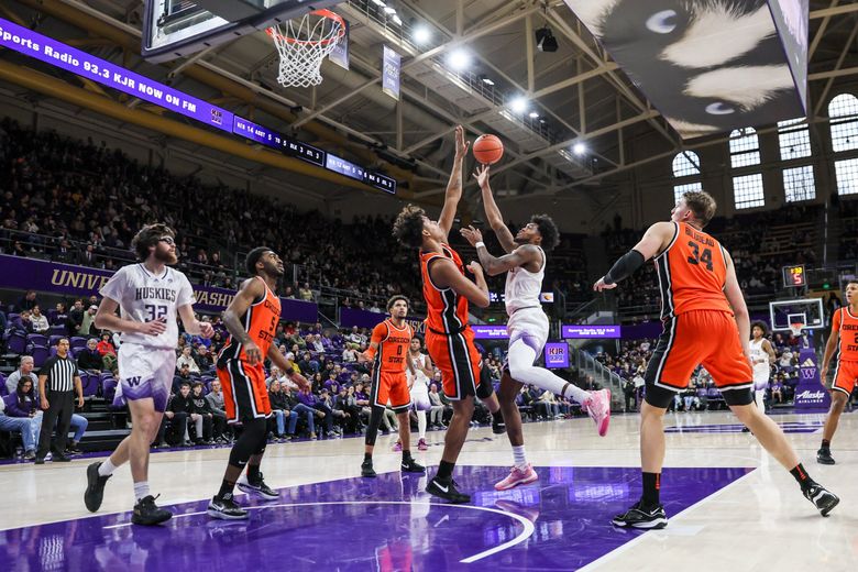 The Washington Huskies play Oregon State Beavers in the first half at Alaska Airlines Arena in Seattle, in early January. (Kevin Clark / The Seattle Times)