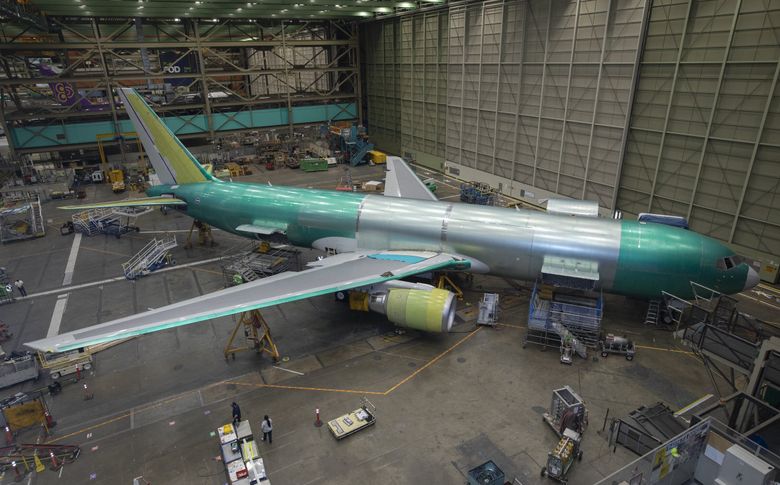 A Boeing 767-300F is built for FedEx at the Everett factory. (Ken Lambert / The Seattle Times, 2022)