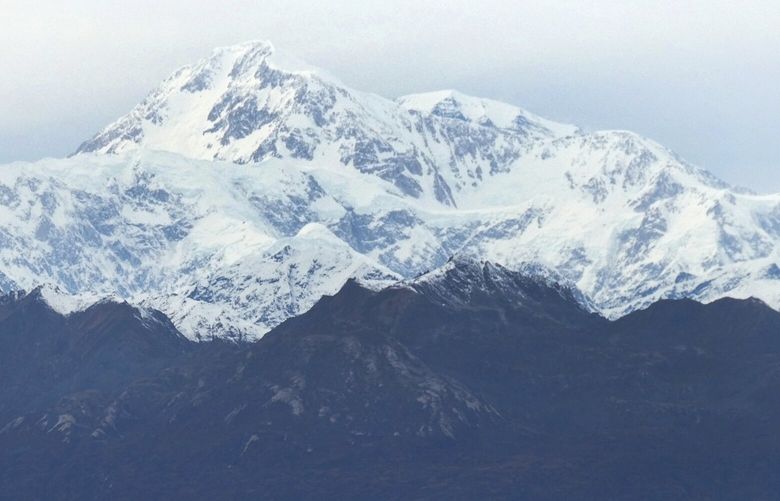 In this Oct. 1, 2017 photo, North America’s tallest peak, Denali, is seen from a turnout in Denali State Park, Alaska. The peak was renamed from Mount McKinley to Denali under President Barack Obama. Alaska U.S. Sen. Dan Sullivan recently said he and Sen. Lisa Murkowski told President Donald Trump they support keeping the name Denali. (AP Photo/Becky Bohrer)