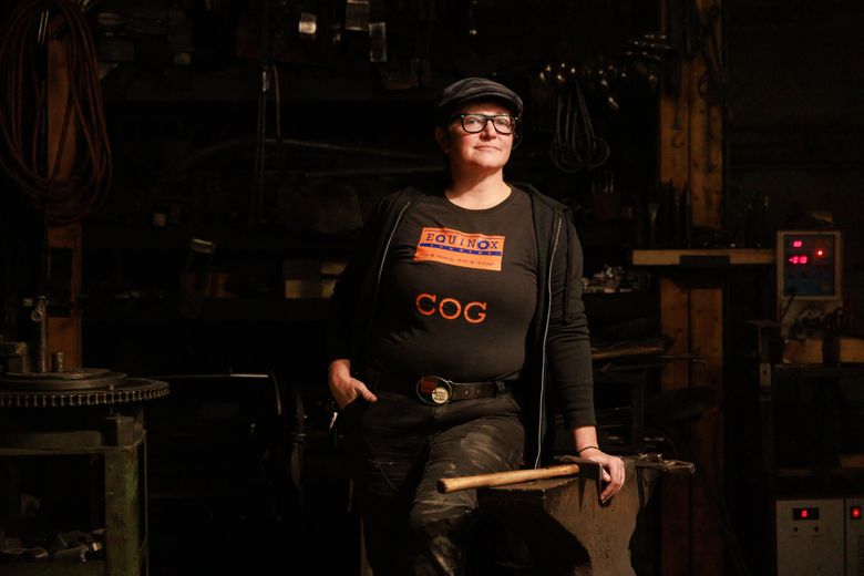 Kay Morrison, co-interim executive director of Watershed Community Development, runs The Blacksmith Shop at Equinox Studios in Georgetown. (Erika Schultz / The Seattle Times)