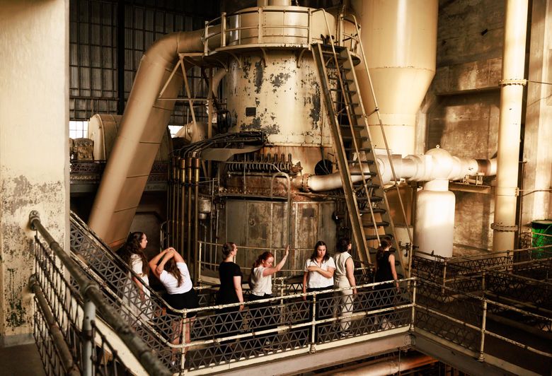 SLOWBURN Dance Company perform at the landmark Georgetown Steam Plant in August. (Erika Schultz / The Seattle Times)