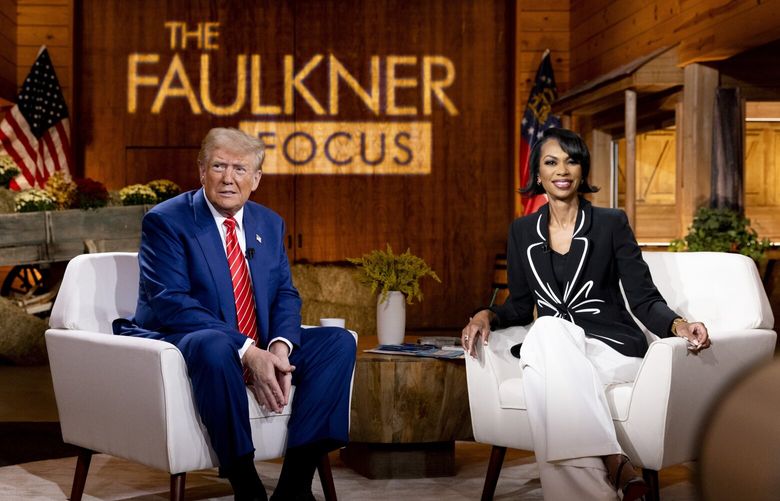 Former President Donald Trump, the Republican presidential nominee, and Harris Faulkner, FOX News presenter, participate in a town hall focusing on issues impacting women in Cumming, Ga., on Tuesday, Oct. 15, 2024. Trump declared himself the “father of IVF.” in a town-hall event Tuesday focused on women’s issues, an eyebrow-raising nickname that was his latest attempt to claim an advantage on a matter that has become a political liability. (Kendrick Brinson/The New York Times) XNYT0391 XNYT0391
