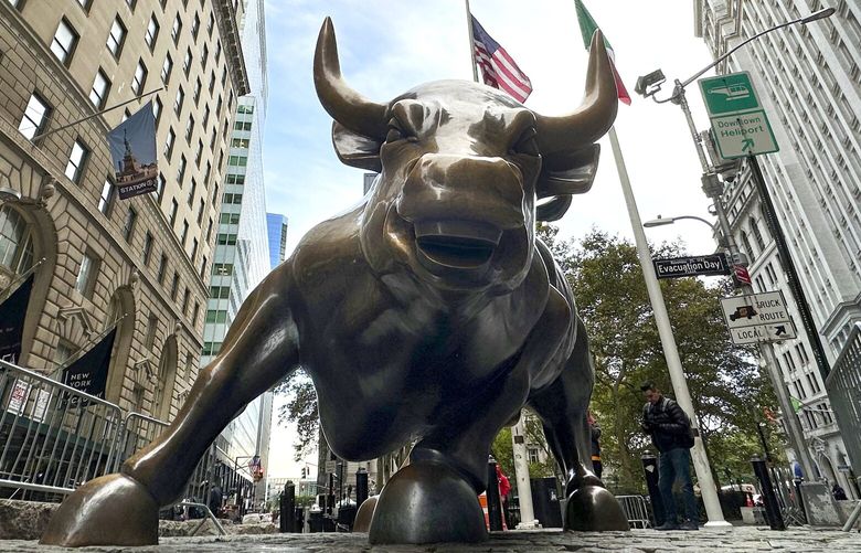 The Charging Bull statue in New York’s Financial District is shown on Tuesday, Oct. 15, 2024. (AP Photo/Peter Morgan) NYPM209