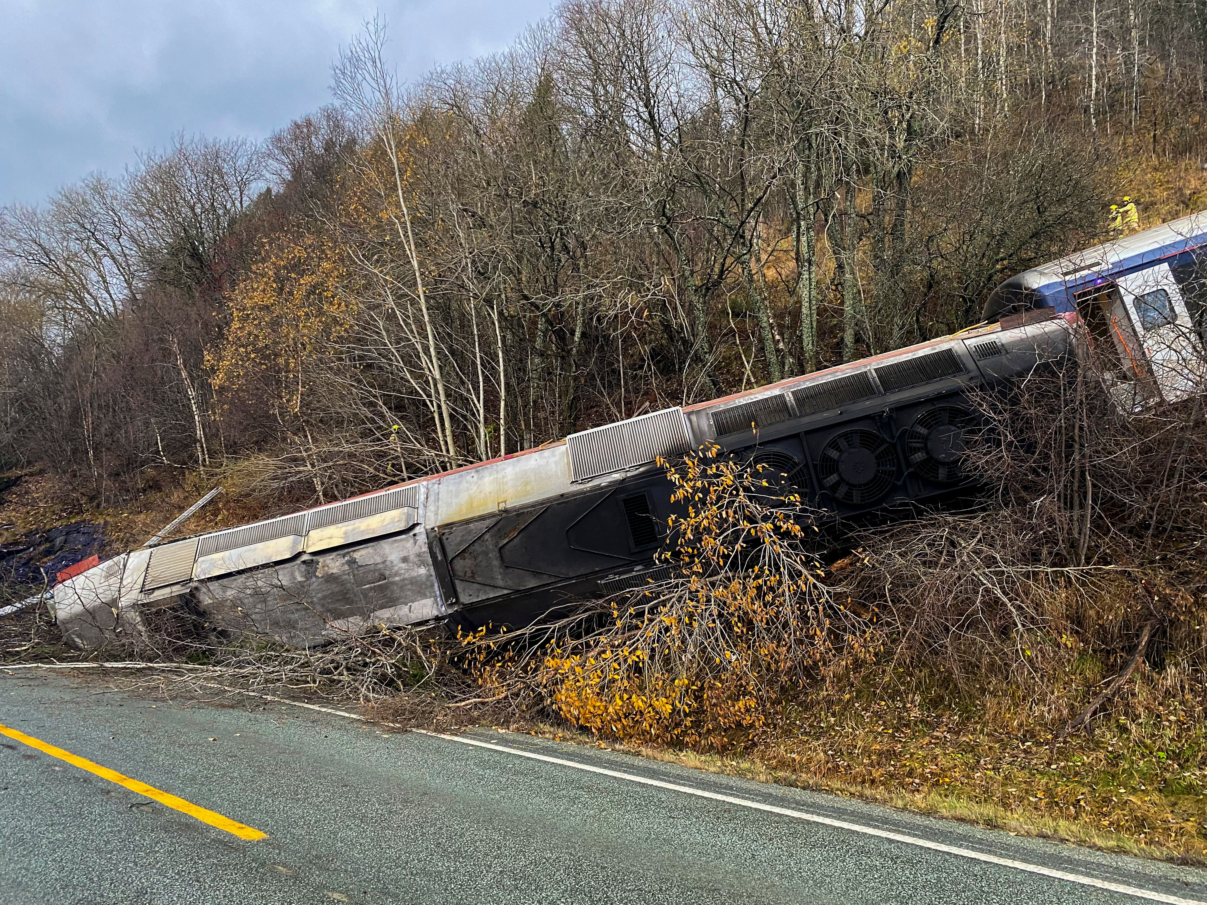 Train carrying 55 people derails on Norway's north coast, killing