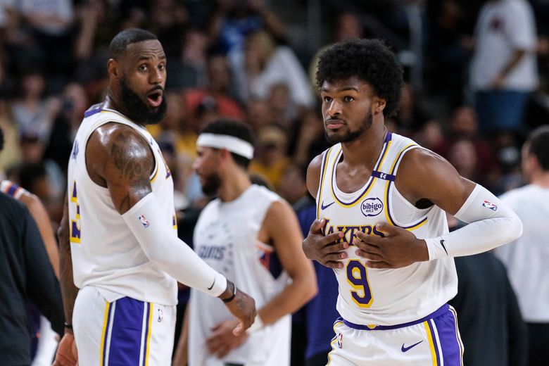 LeBron and son Bronny James play together for the first time in a preseason  game for the Lakers | The Seattle Times