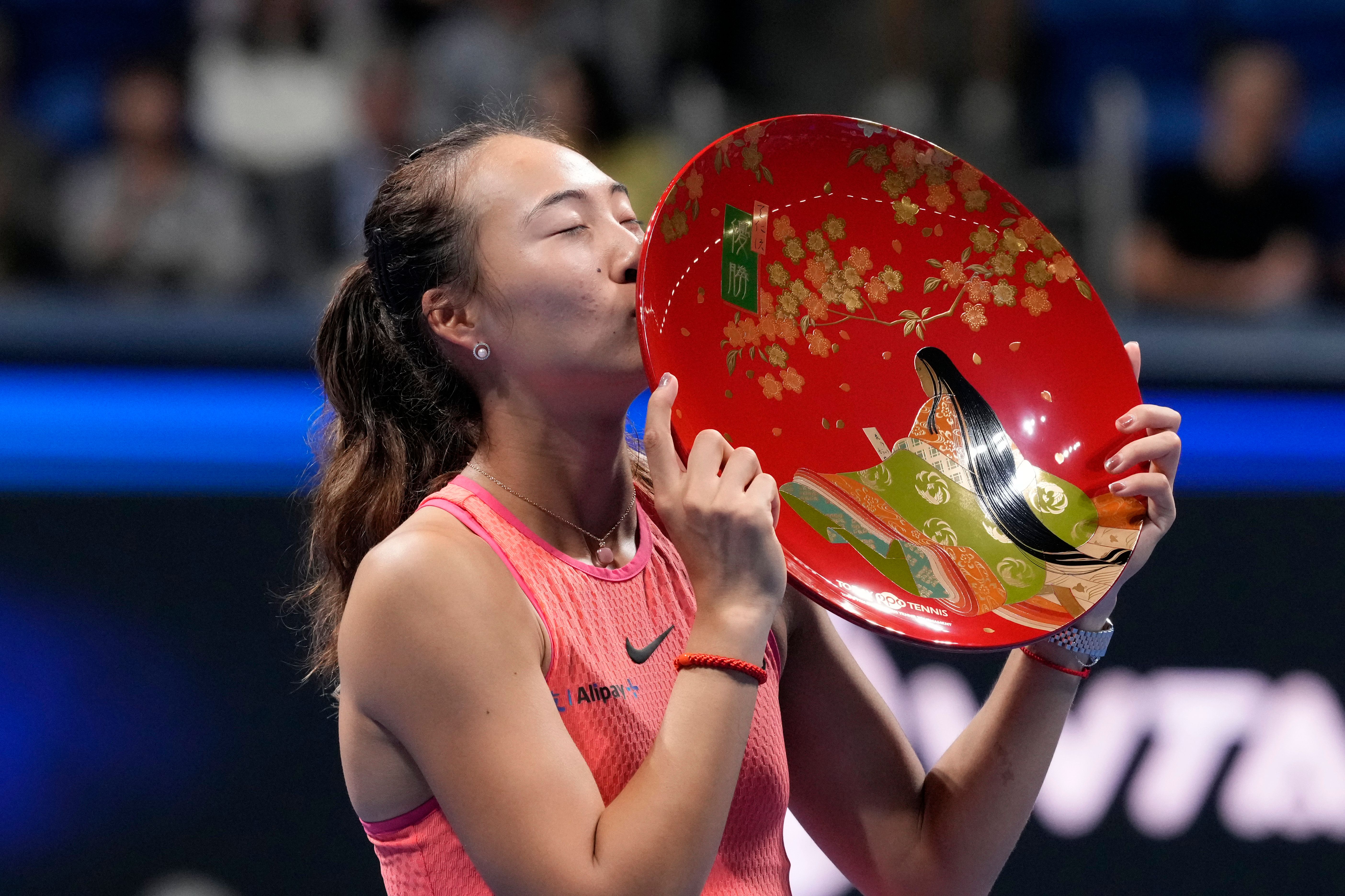 Qinwen Zheng defeats wild card Sophia Kenin to win in Tokyo and