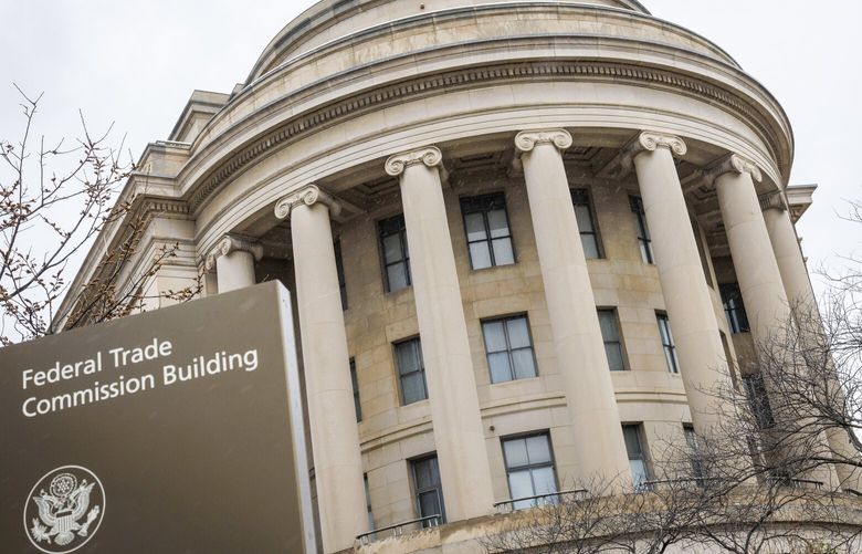 Signage outside the Federal Trade Commission (FTC) headquarters in Washington, DC, US, on Friday, Feb. 17, 2023. A slew of business groups joined the US Chamber of Commerce in opposing the FTC’s proposal to ban non-compete agreements, arguing it would limit their ability to protect confidential information.