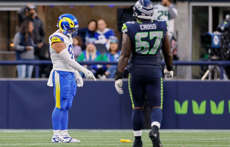 Los Angeles Rams linebacker Michael Hoecht points to a penalty flag for holding on the Seahawks during the fourth quarter Sunday, Nov. 3, 2024 in Seattle. 228418