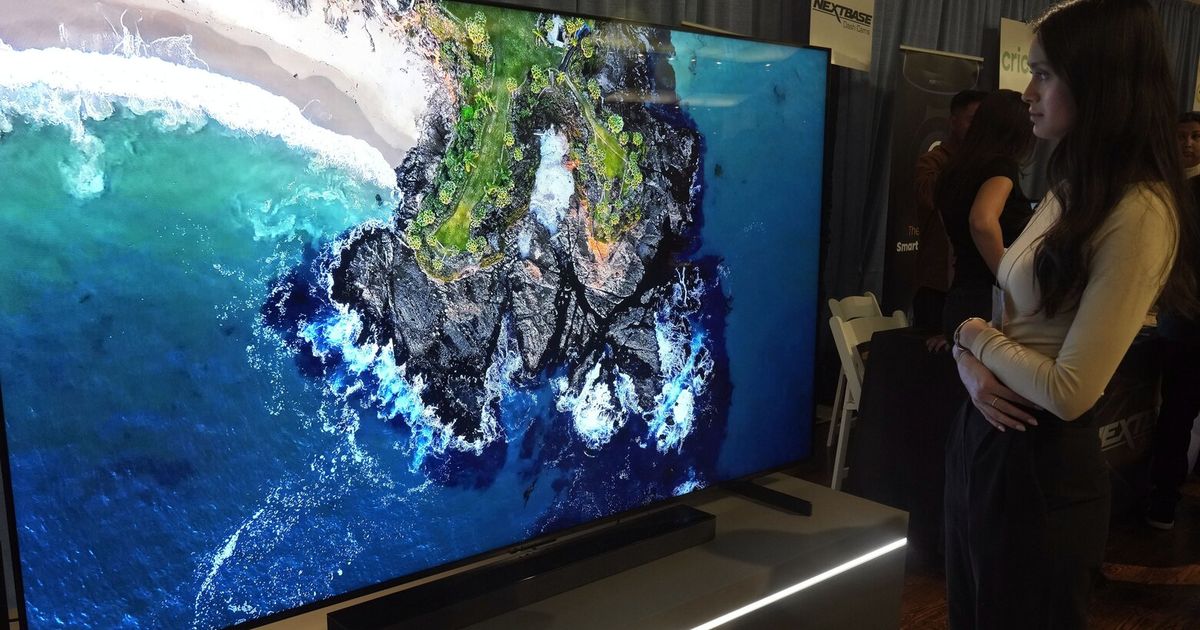 A TV as big as a bed? With the holidays approaching, stores stock more supersize sets