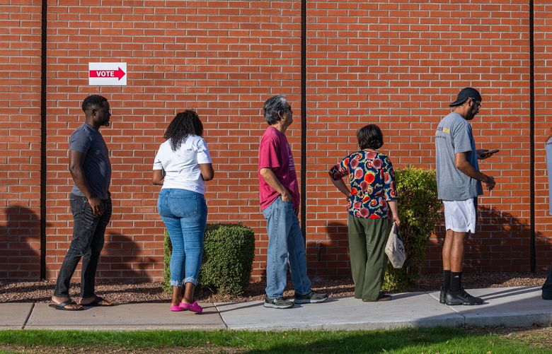 Early voting at the Osborn Elementary School in Phoenix, Nov. 1, 2024. Nearly 75 million people have cast early ballots, making their voices heard amid worry about the process, the outcome and democracy itself. (Ash Ponders/The New York Times) XNYT0860 XNYT0860