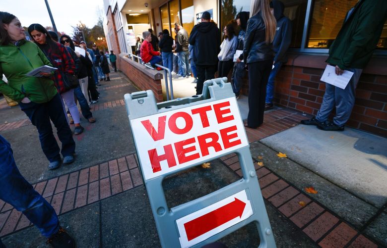 Long lines form outside the Clark County Department of Elections office in Vancouver on Monday, November 4, 2024. People stood in line, some waiting up to two hours, to register or get a replacement ballot. Incumbent Democrat Marie Gluesenkamp Perez and Republican Joe Kent are in a rematch after she won in the traditionally conservative Washington’s 3rd District in 2022.