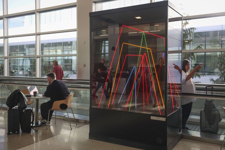 “Infinity Column” by John Geise pictured at Seattle–Tacoma International Airport. (Ivy Ceballo / The Seattle Times)